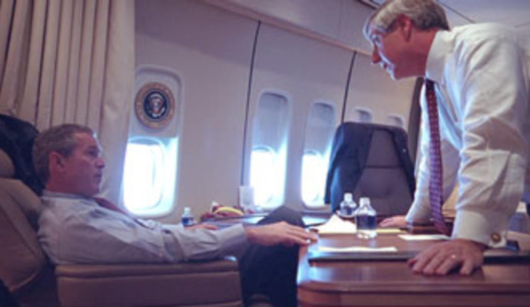 President George W. Bush speaks with White House Chief of Staff Andy Card Tuesday, Sept. 11, 2001, aboard Air Force One. Photo by Eric Draper, Courtesy of the George W. Bush Presidential Library