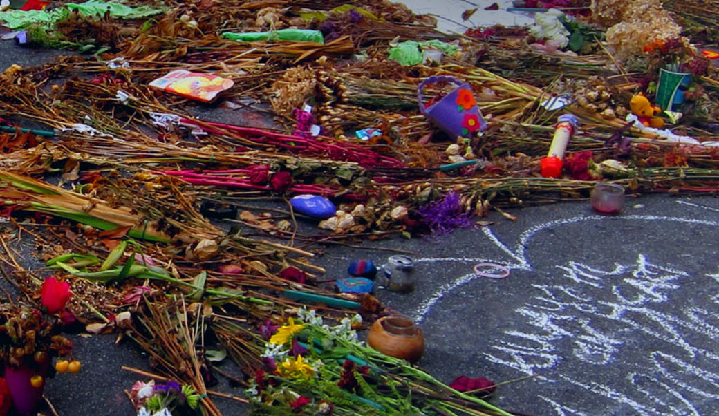 Flower memorial at intersection where Heather Heyer was struck down by white terrorist