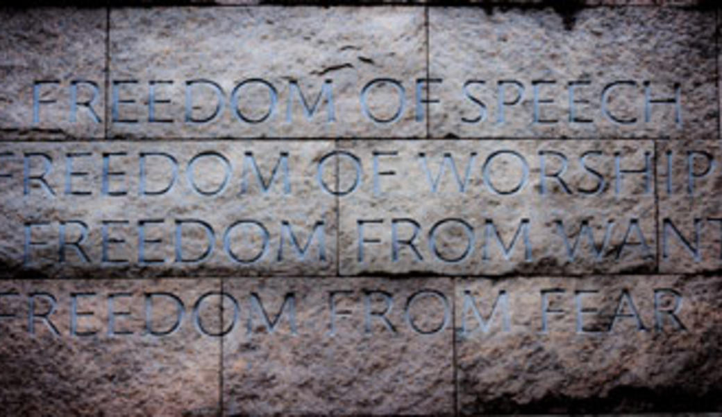 Inscription of FDR's four freedoms on a stone wall